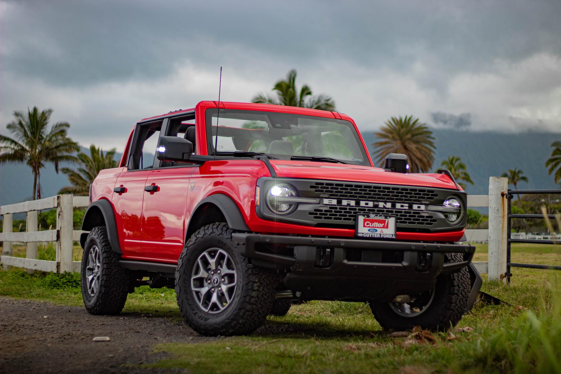 Picture of the car https://harrishawaiiphotos.s3.us-west-2.amazonaws.com/redbronco/red+bronco+(124+of+132).jpg