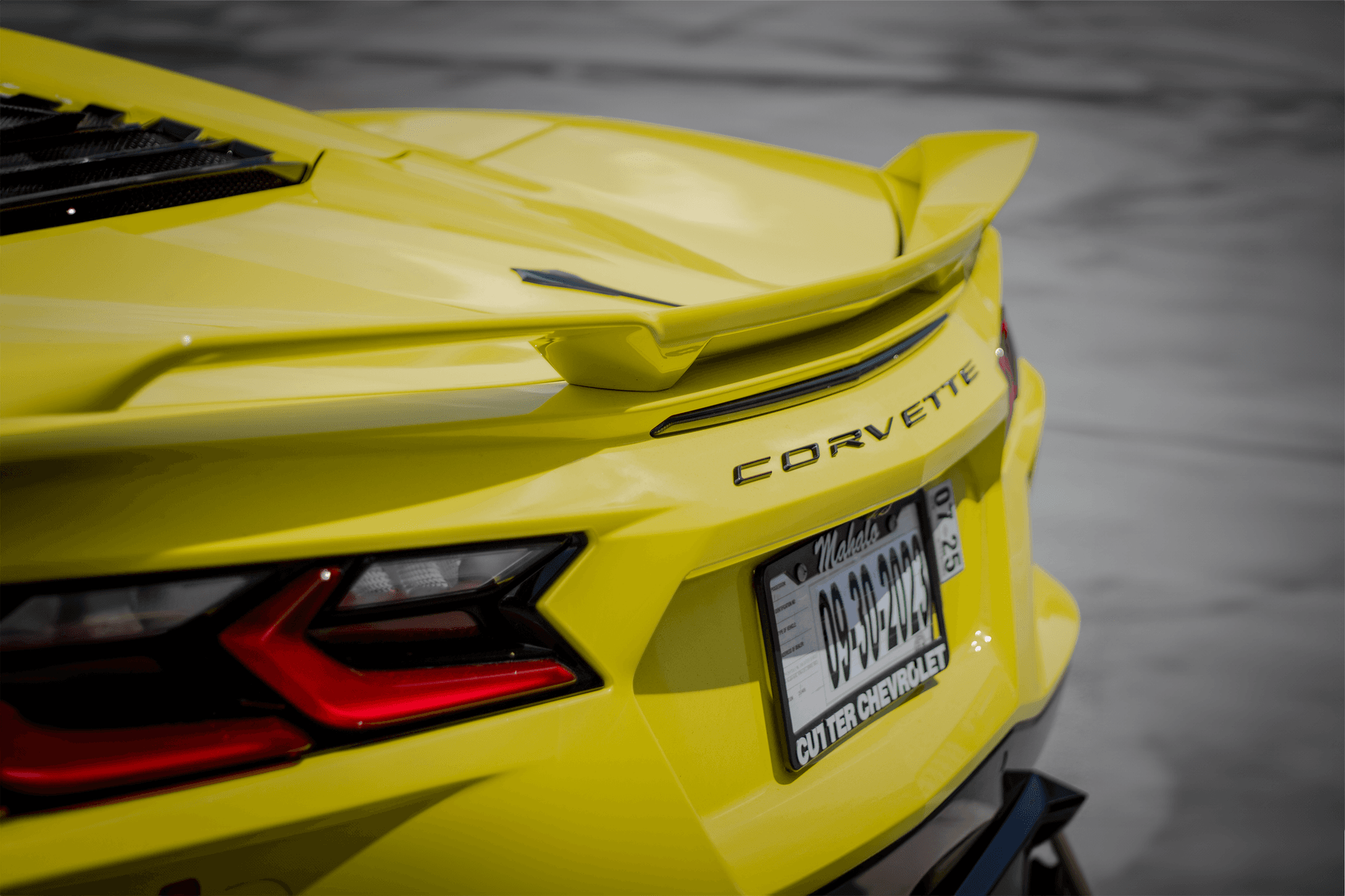 Picture of the car https://harrishawaiiphotos.s3.us-west-2.amazonaws.com/yellowcorvette/1rear+badge.png